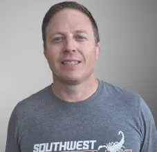 Coach Curtis Owen head club wrestling coach