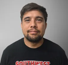 Coach Michael Fujimori assistant club wrestling coach