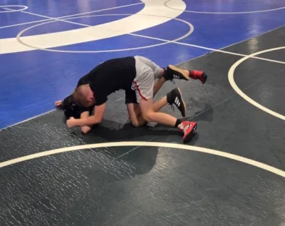 kids doing live positional wrestling and drilling