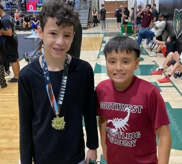 Two wrestlers at Glenn Alford Memorial Tournament 11/15/2025